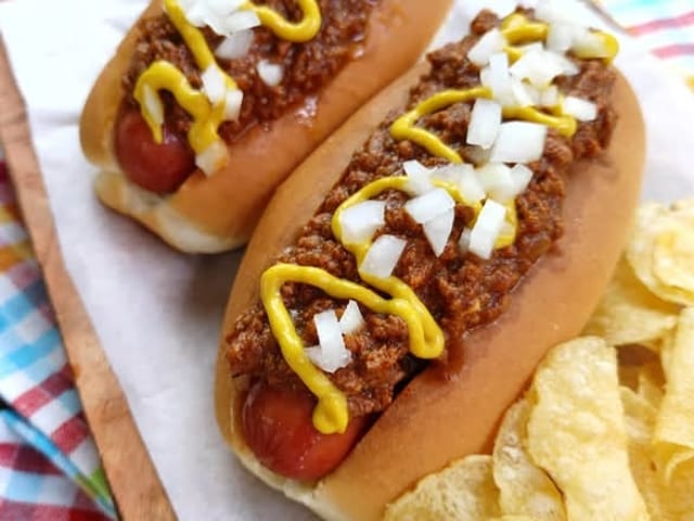 2 Boar's Head Hot Dogs with Kettle Chips.